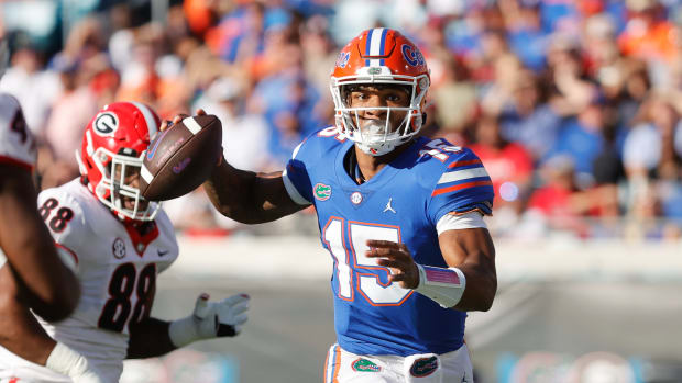 Oct 30, 2021; Jacksonville, Florida, USA; Florida Gators quarterback Anthony Richardson (15) throws the ball against the Georgia Bulldogs during the first half at TIAA Bank Field. Mandatory Credit: Kim Klement-USA TODAY Sports